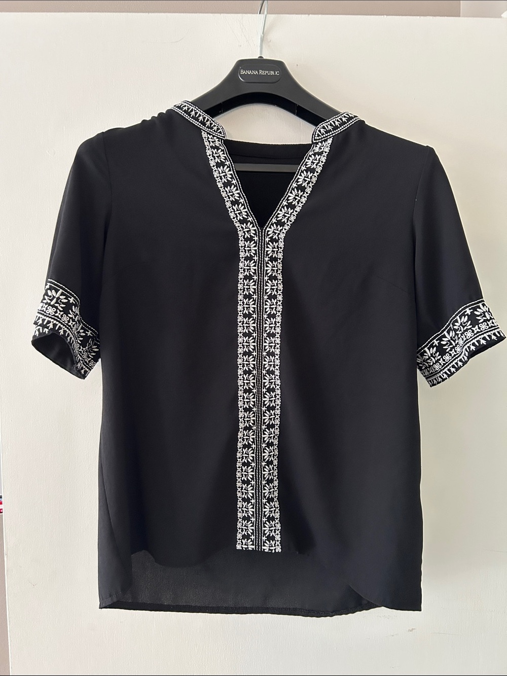 Black Short-Sleeve V-Neck Blouse with White Embroidered Trim